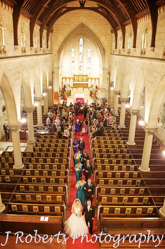 Bridal party walking down the aisle with an aerial view at St Thomas' North Sydney - wedding photography sydney